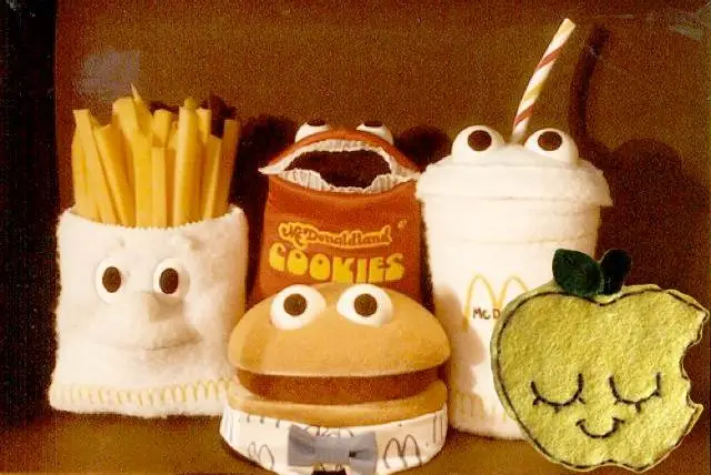 The latest addition to the Happy Meal family? That sleepy little fruit on the right.